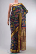 Blue Kanchipuram Silk Saree with Printed design on the body and Zari Border displayed on a mannequin