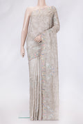 Grey Dual Tone Tussar Silk Saree with Embroidery on the body and Embroidery Border.  displayed on a mannequin