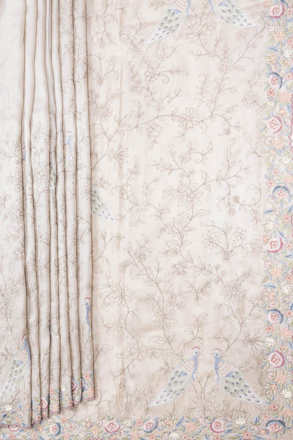 Pleats and pallu of Grey Dual Tone Tussar Silk Saree with Embroidery on the body and Embroidery Border. 