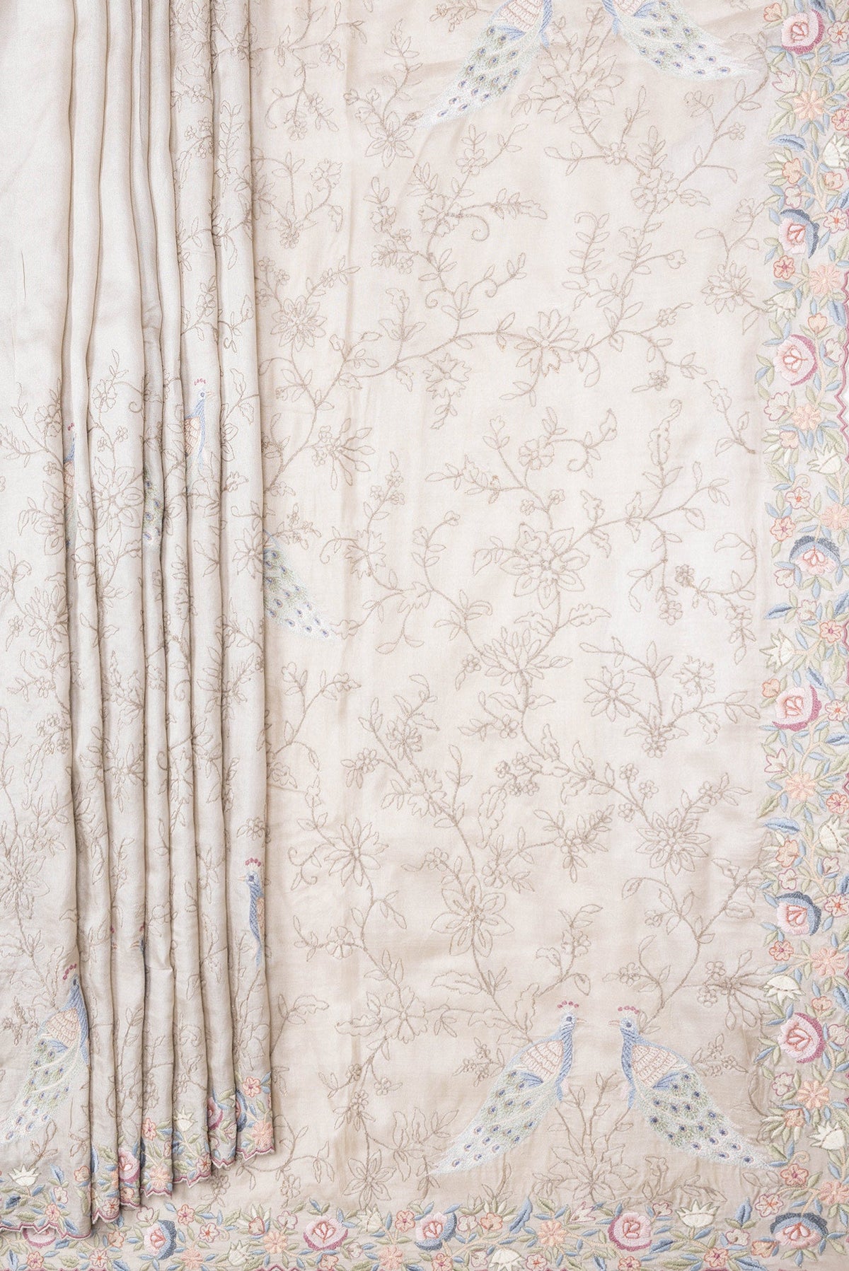 Pleats and pallu of Grey Dual Tone Tussar Silk Saree with Embroidery on the body and Embroidery Border. 