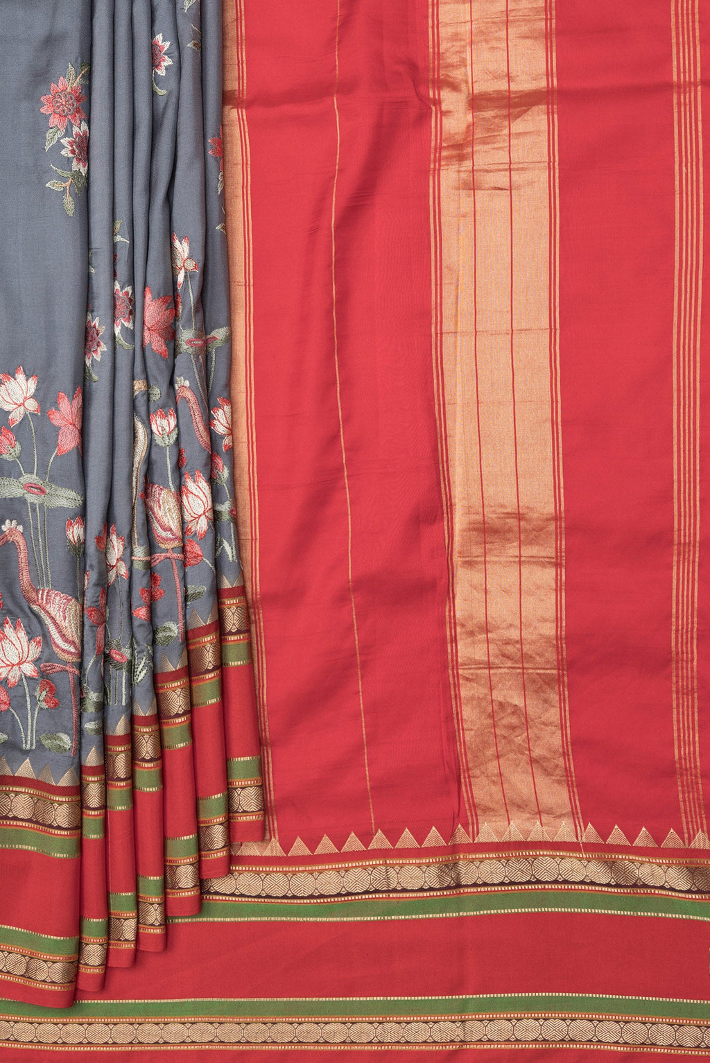 Pleats and pallu of Grey Dual Tone Kanchipuram Silk Saree with Embroidery on the body and Zari Border. 