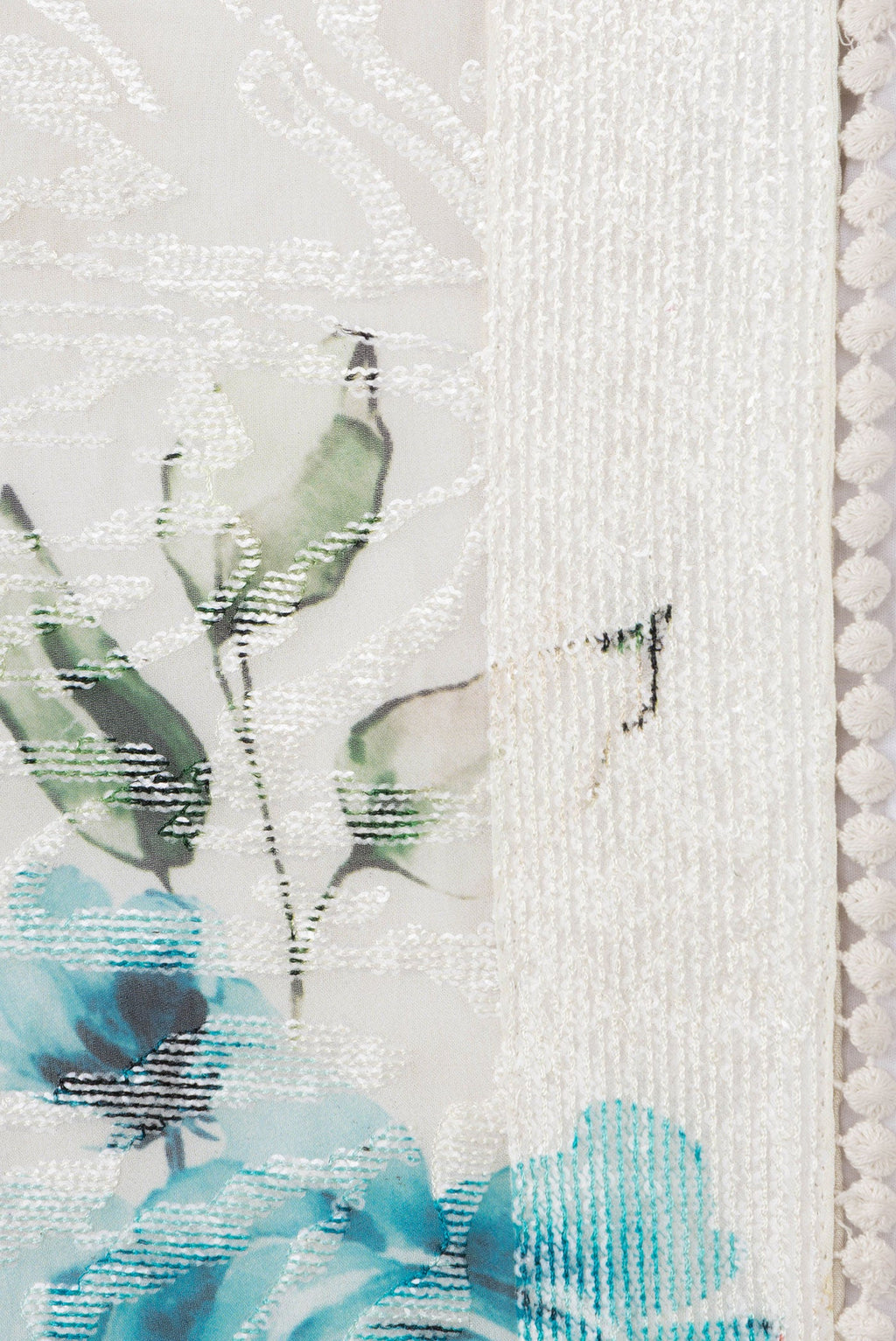 Border image of Lavender and Sea Green Color Georgette Saree with Embroidery on the body and Embroidery Border. 