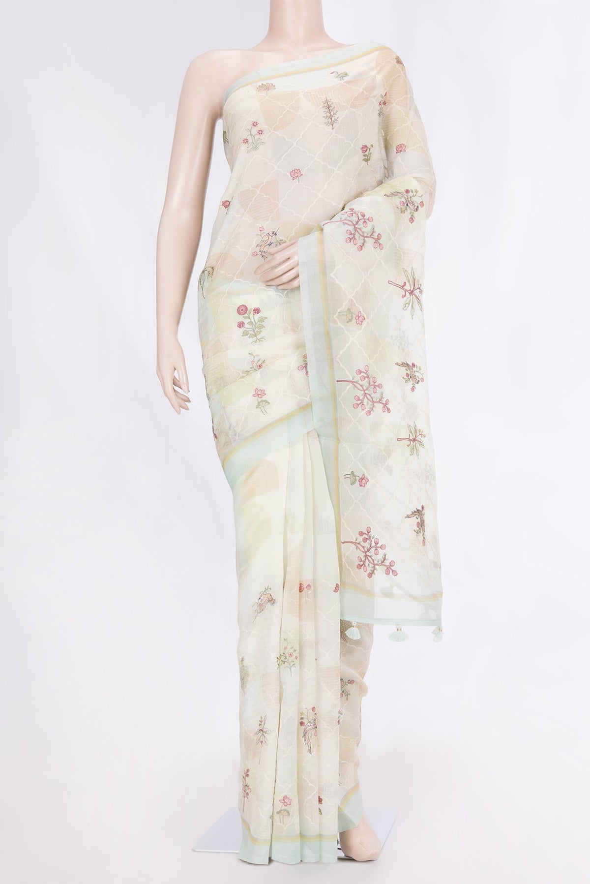 Beige Dual Tone Organza Silk Saree with Embroidery on the body and Fancy Border displayed on a mannequin