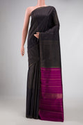 Pure Silk Pure Zari Coffee Brown Dual Tone Kanchipuram Saree with Zari Butta on the body and Thin Zari Line displayed on a mannequin