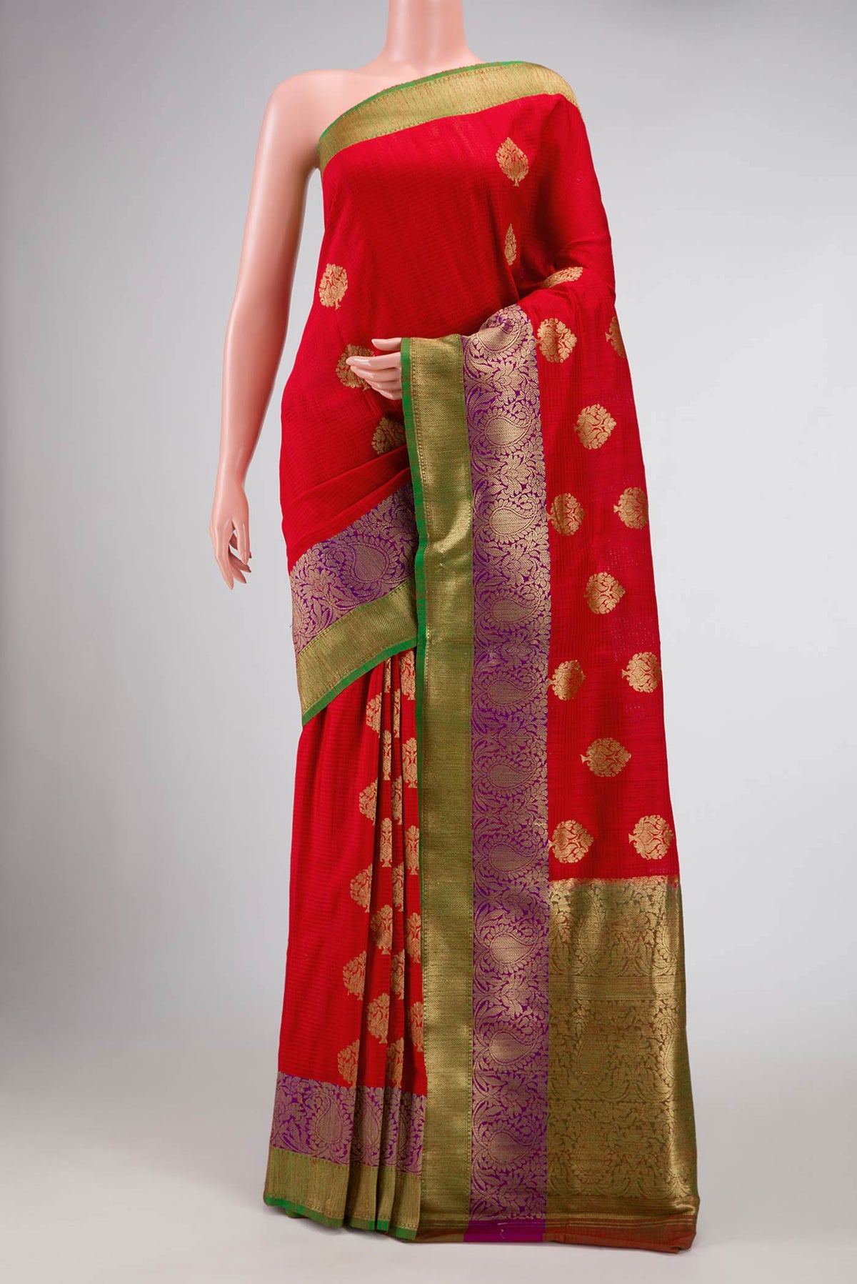 Red Banarasi Tussar Silk Saree with Zari Butta on the body and Zari Border displayed on a mannequin