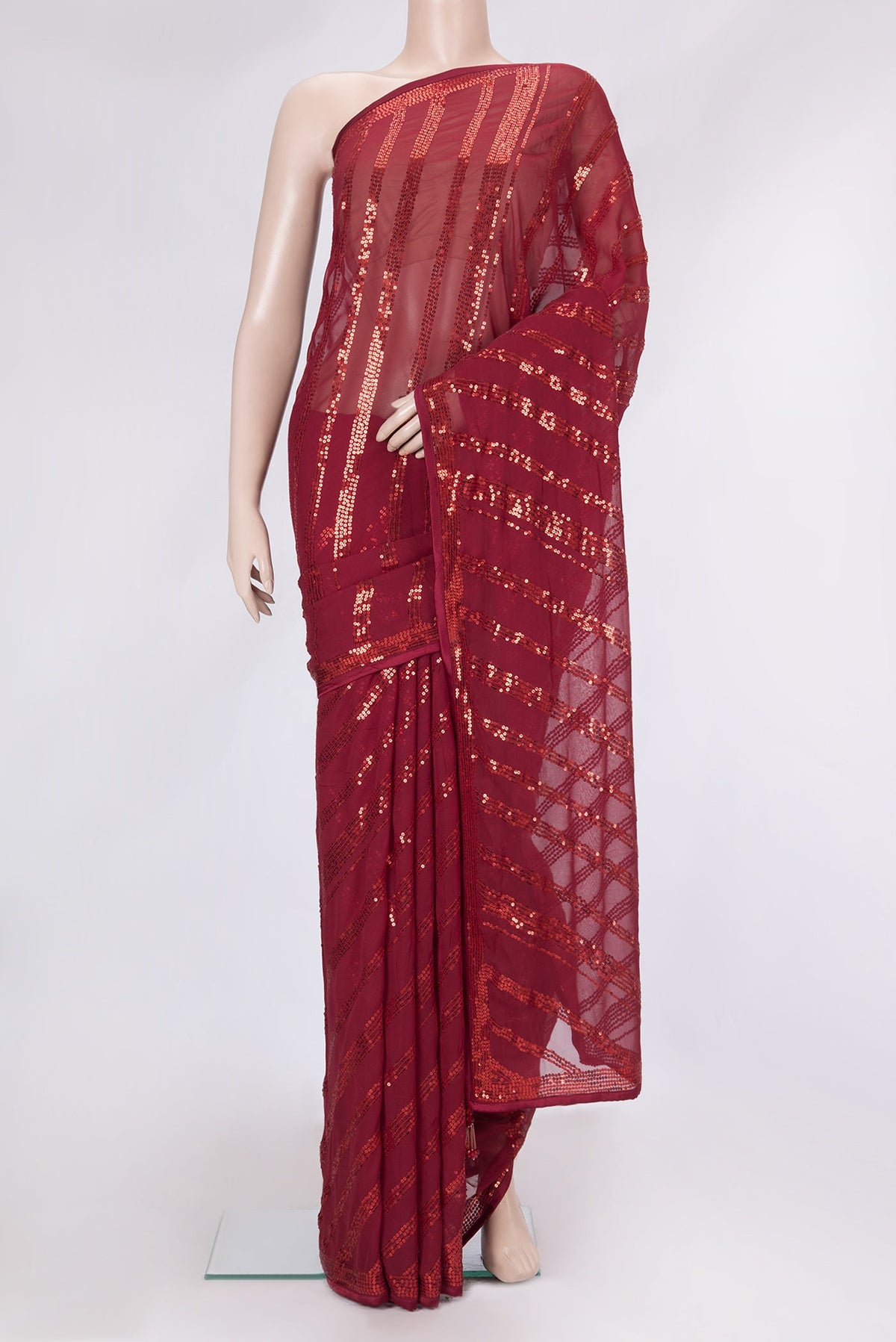 Maroon Dual Tone Mysore Georgette Saree with Embroidery on the body and Embroidery Border.  displayed on a mannequin