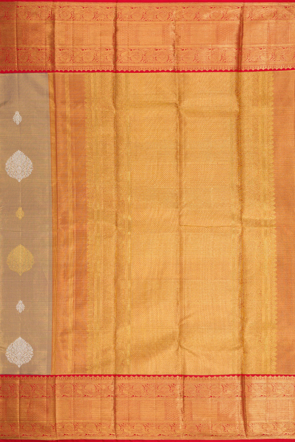Close up image of the pallu of Gold Dual Tone Kanjivaram Tissue Silk Saree with Zari Brocade on the body and Zari Border. 