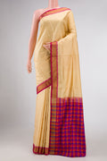 Sandal Dual Tone Rajkot Patola Silk Saree with Plain Body and Zari Border displayed on a mannequin