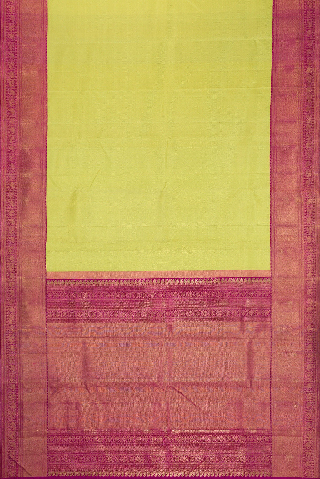 Flat view of Pure Silk Pure Zari Parrot Green Dual Tone Kanjivaram Saree with Zari Brocade on the body and Zari Border. 