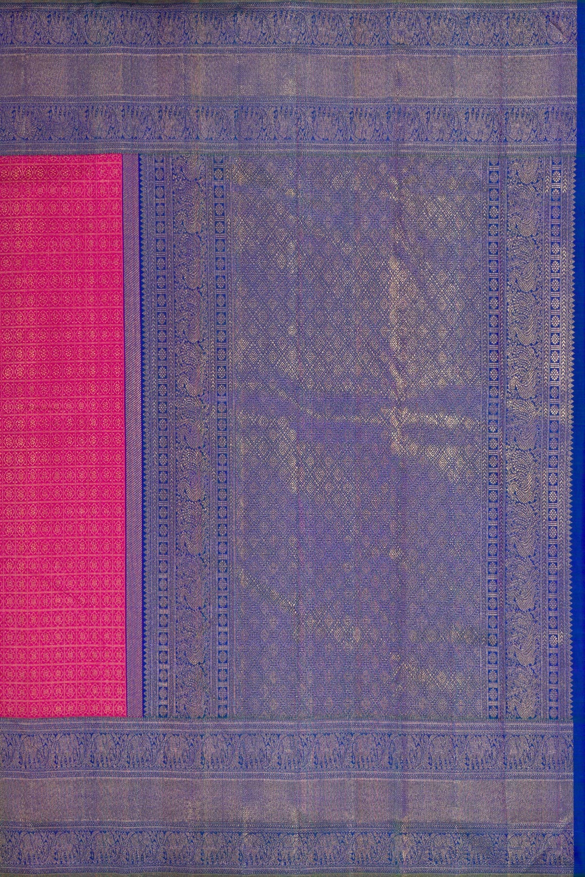 Close up image of the pallu of Dark Pink Dual Tone Kanjivaram Silk Saree with Zari Brocade on the body and Zari Border. 
