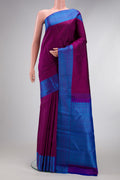Magenta Dual Tone Kanchipuram Silk Saree with Jacquard design on the body and Thread Border.  displayed on a mannequin