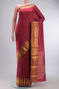 Red Kanchipuram Silk Saree with Zari Butta on the body and Zari Border displayed on a mannequin