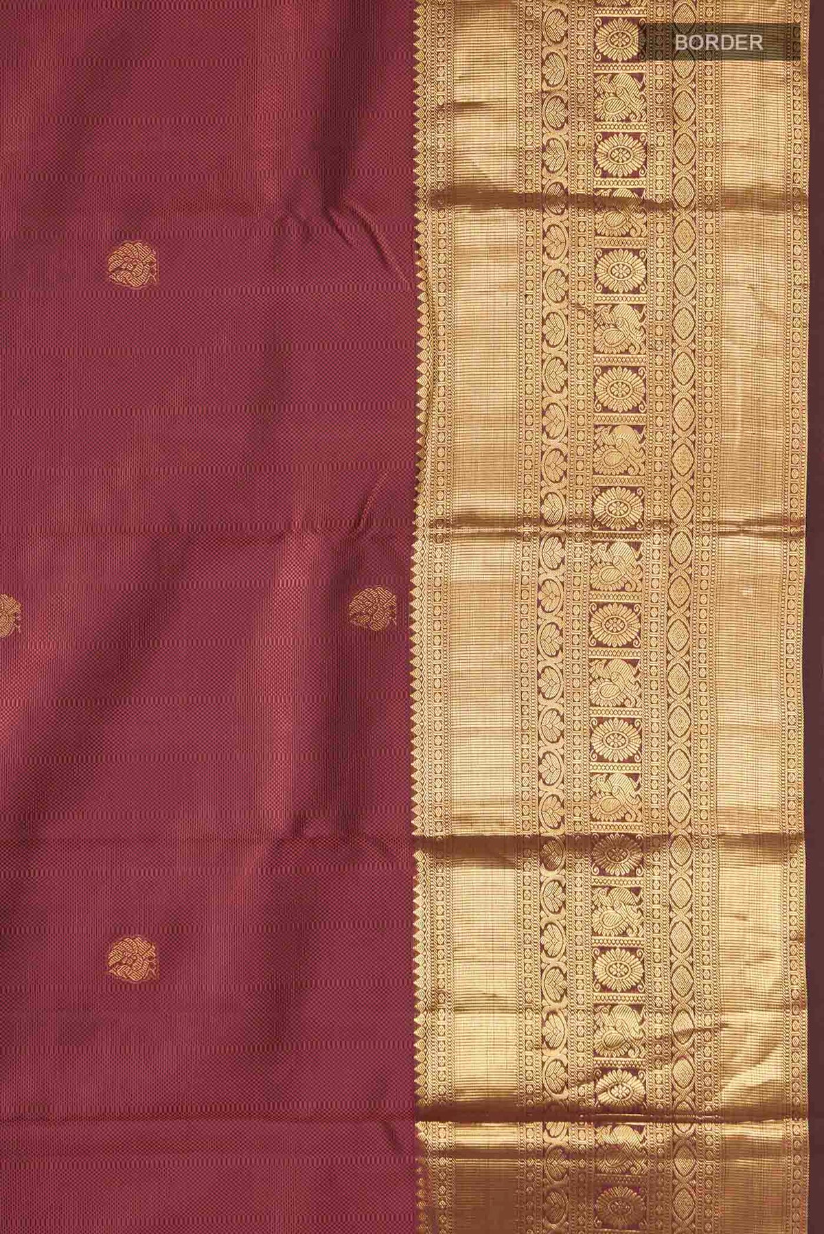 Border image of Maroon Kanchipuram Silk Saree with Jacquard With Zari Butta on the body and Zari Border