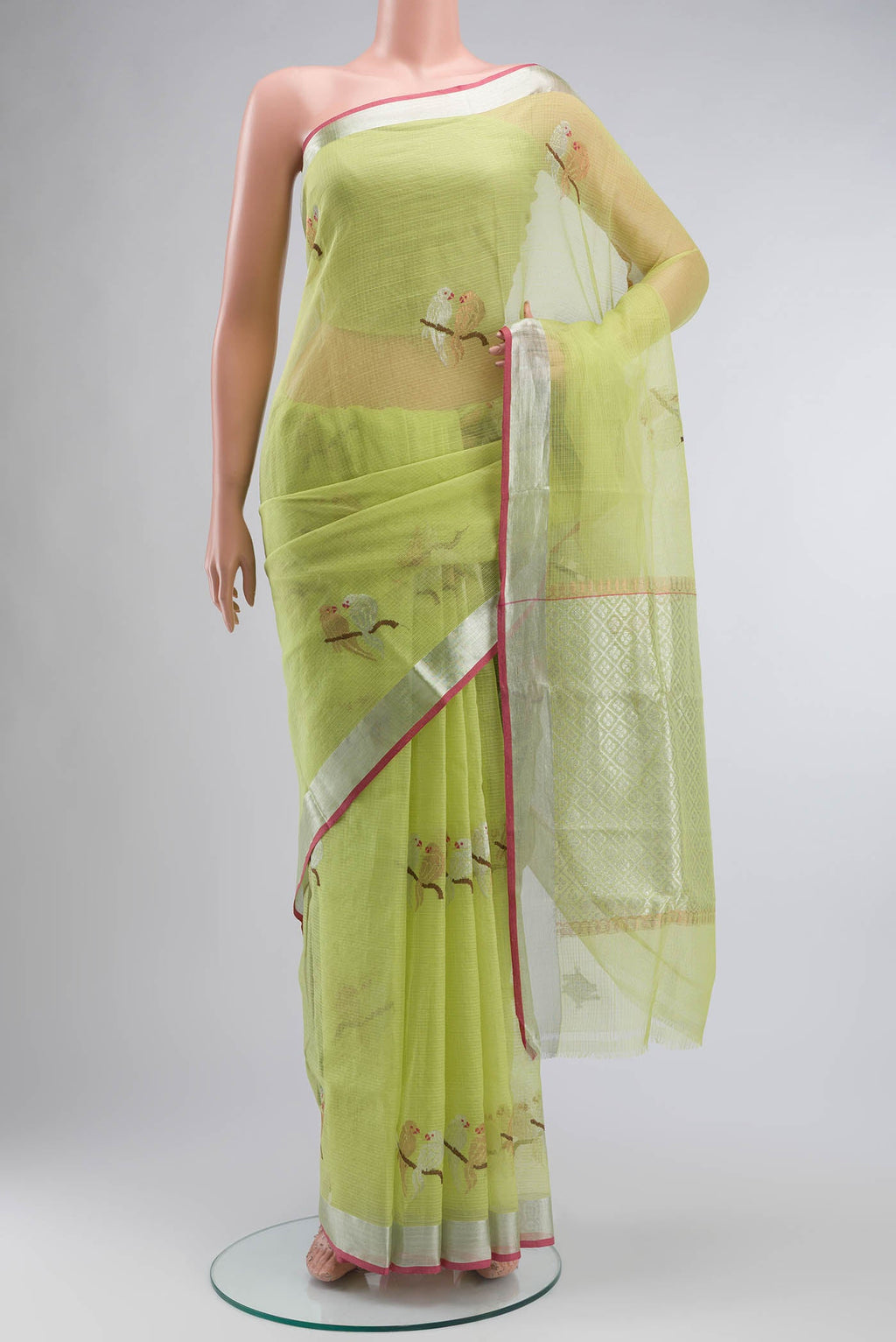 Green Kota Silk Saree with Zari Butta on the body and Zari Border displayed on a mannequin
