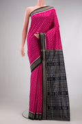 Pink Dual Tone Double Ikat Saree with Ikat Print on the body and Thread Border.  displayed on a mannequin