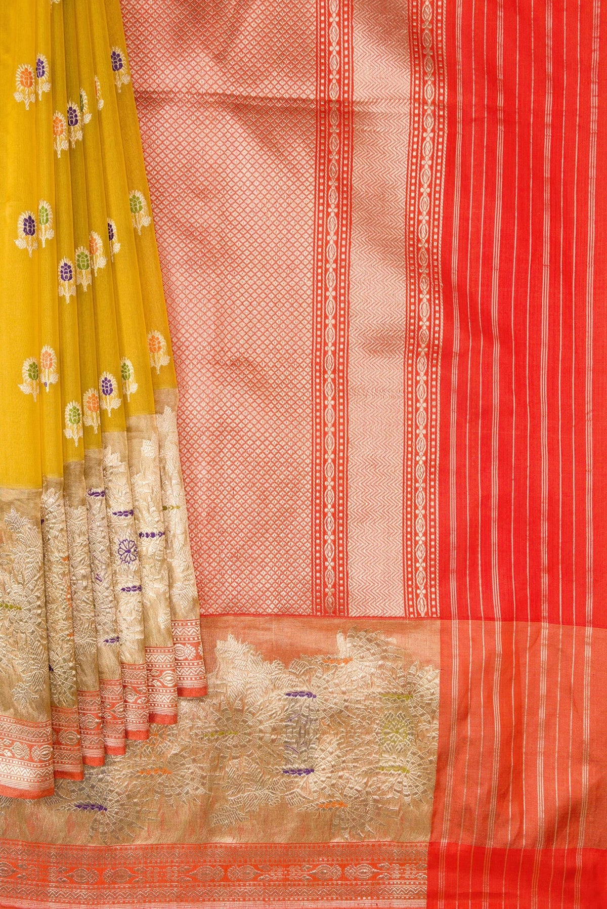 Pleats and pallu of Mehandi Green Dual Tone Organza Silk Saree with Zari And Thread Butta on the body and Zari Border. 