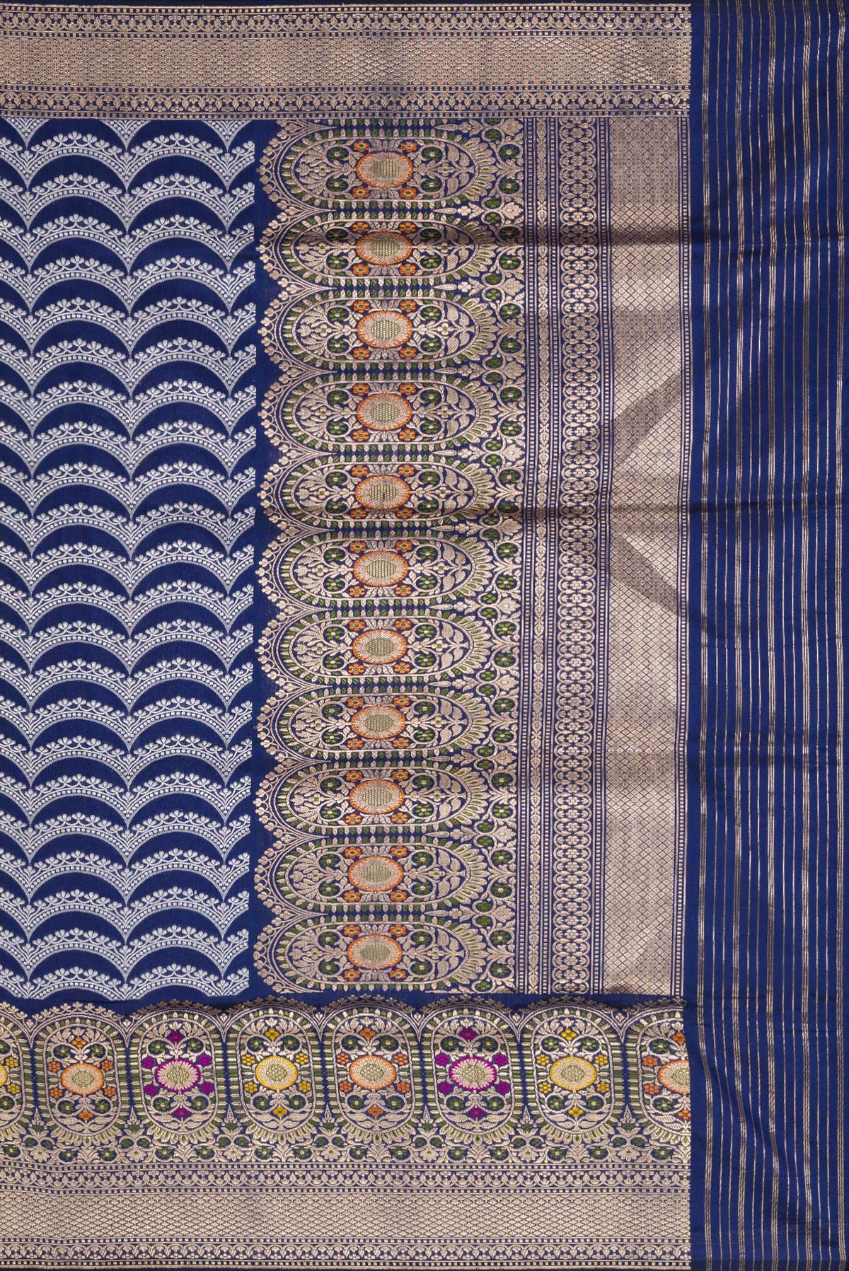 Close up image of the pallu of Navy Blue Dual Tone Banarasi Silk Saree with Stripes on the body and Zari Border. 