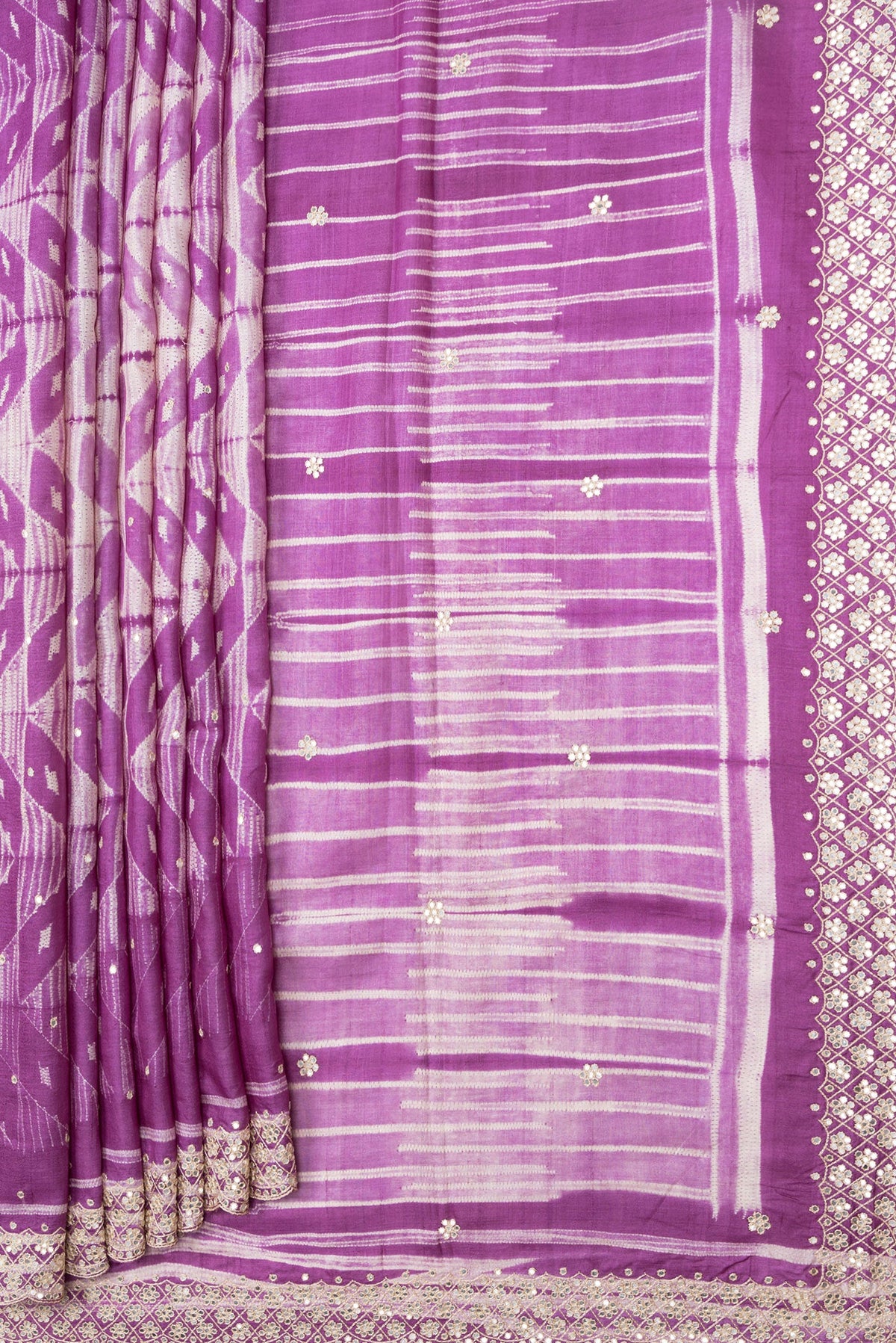 Pleats and pallu of Purple Dual Tone Tussar Silk Saree with Embroidery on the body and Embroidery Border. 