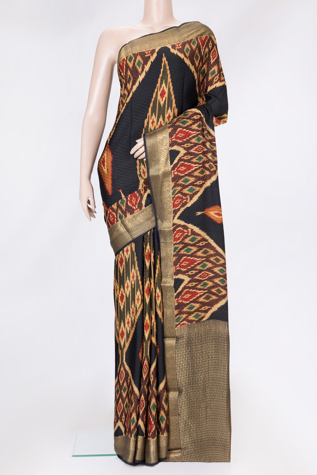 Black Dual Tone Mysore Crepe Saree with Printed design on the body and Zari Border.  displayed on a mannequin
