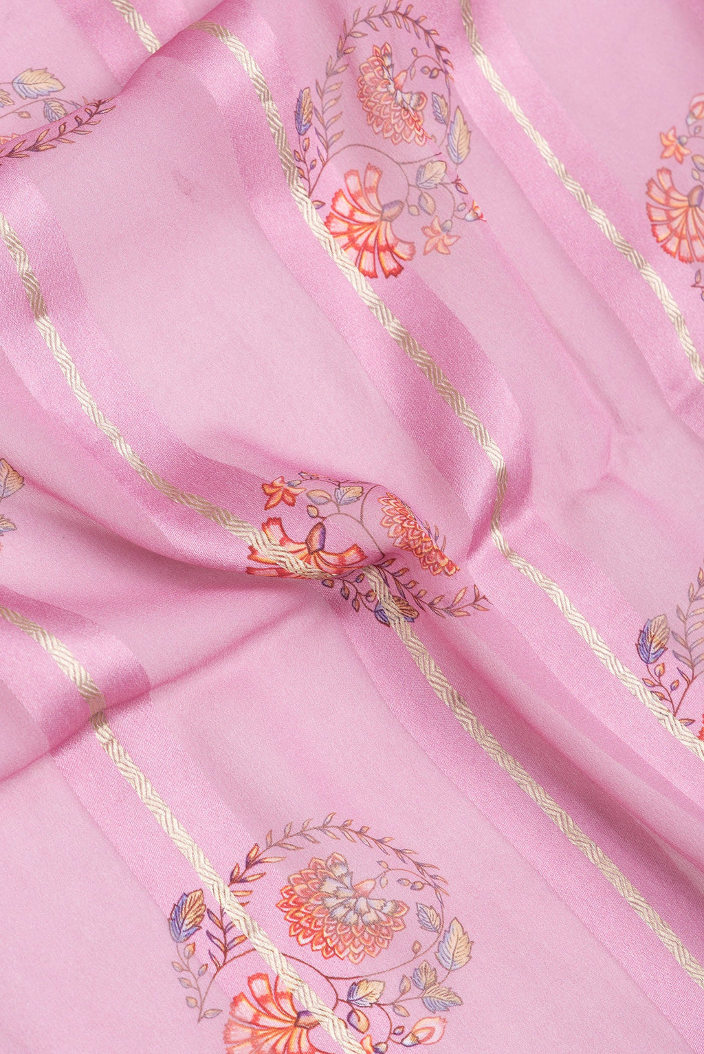 Close up of Pink Dual Tone Mysore Georgette Saree with Printed design on the body and Zari Border.  displaying folds
