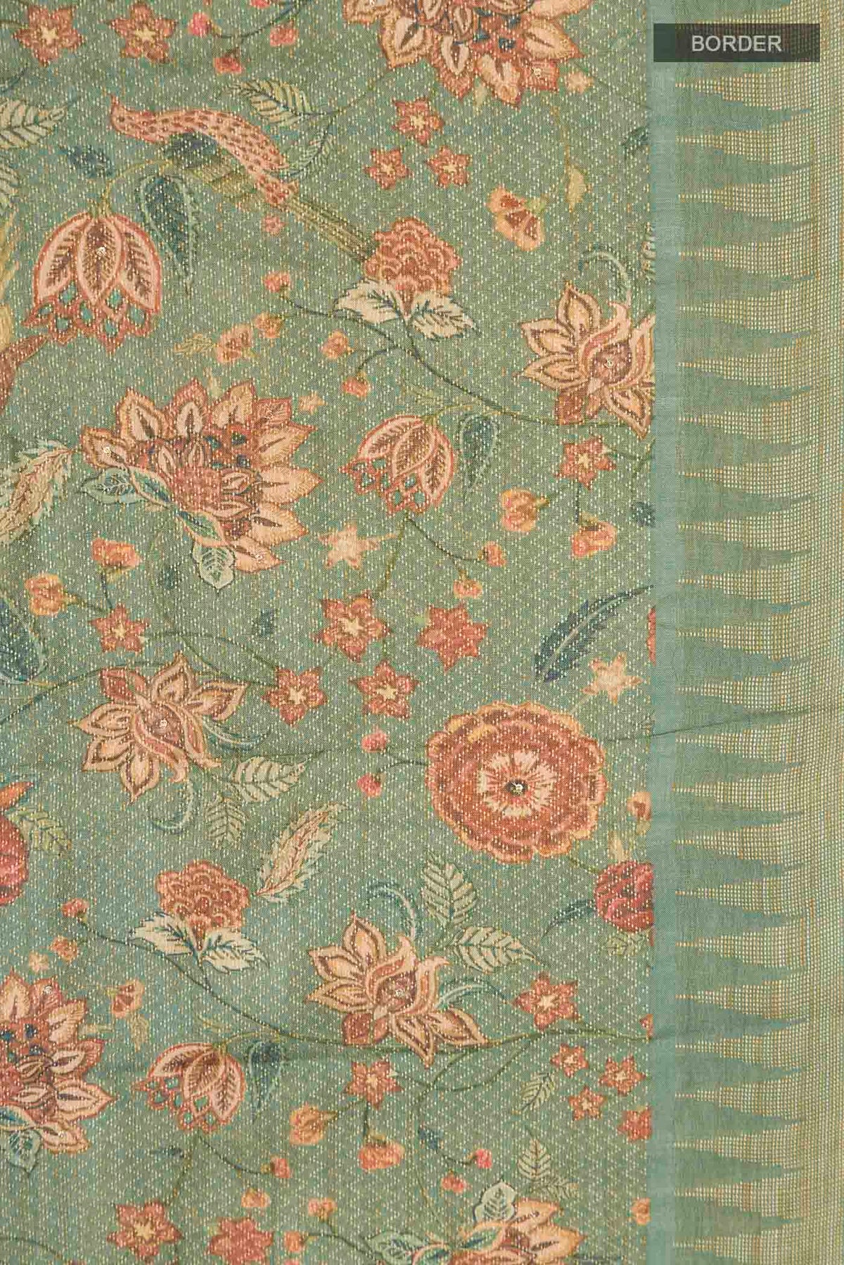 Border image of Green Tussar Silk Saree with Printed design on the body and Zari Border