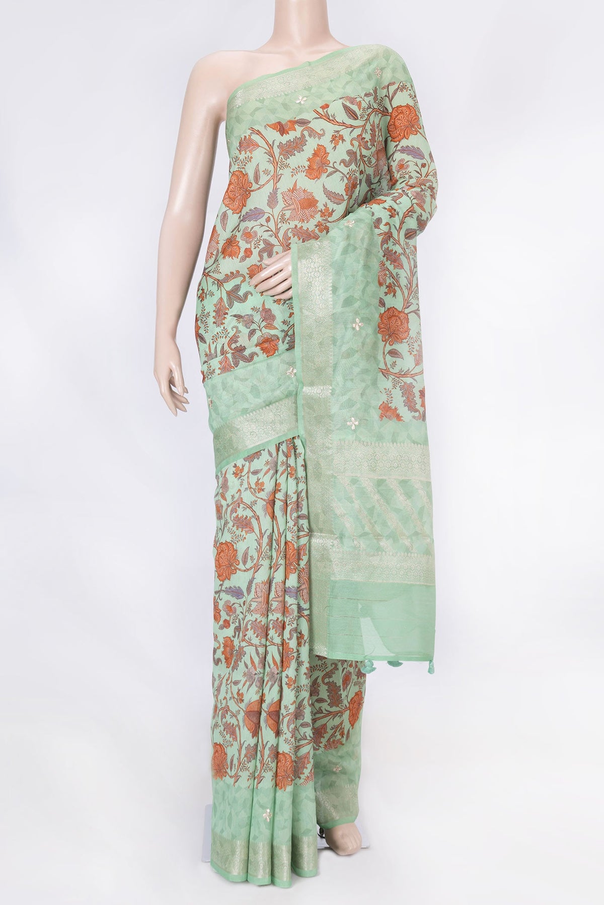 Sea Green Dual Tone Chanderi Silk Saree with Printed design on the body and Zari Border displayed on a mannequin