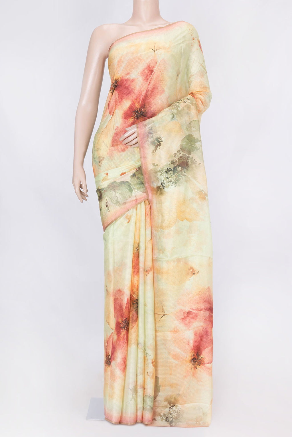 Pista Green Dual Tone Blended Kota Silk Saree with Printed design on the body and Zari Border displayed on a mannequin