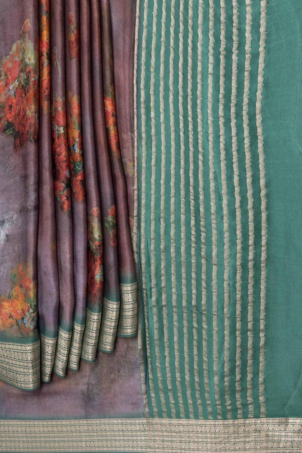 Pleats and pallu of Mauve Satin Silk Saree with Floral Print on the body and Zari Border