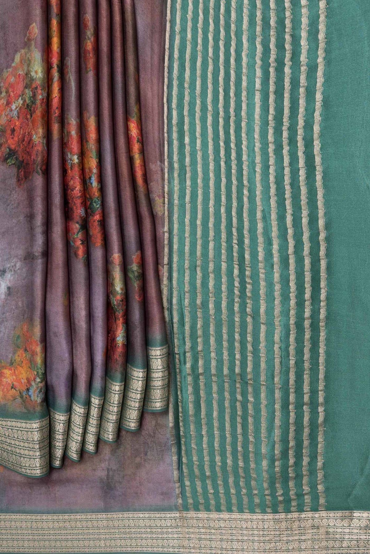 Pleats and pallu of Mauve Satin Silk Saree with Floral Print on the body and Zari Border