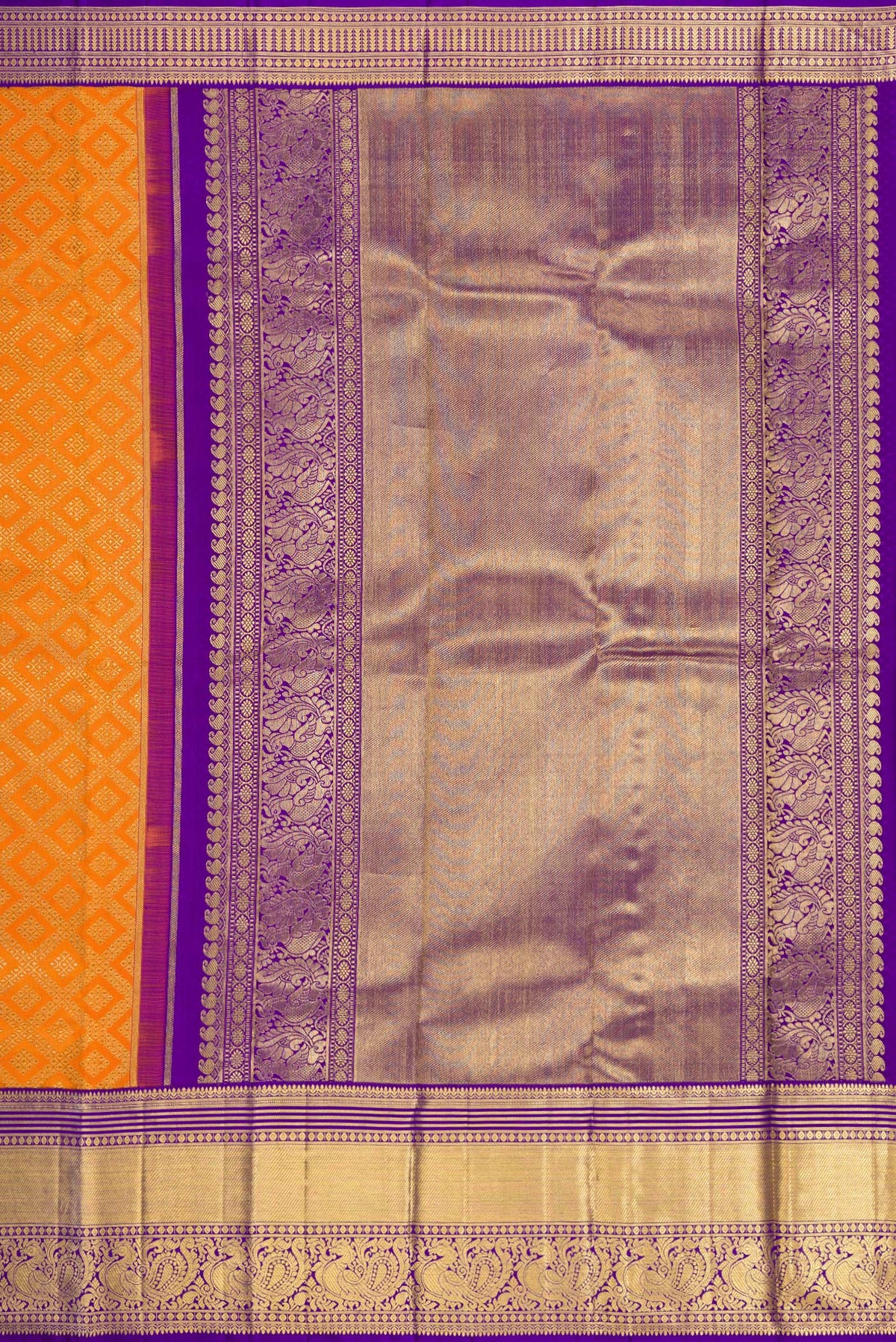 Close up image of the pallu of Pure Silk Pure Zari Orange Dual Tone Kanjivaram Saree with Zari Brocade on the body and Zari Border. 