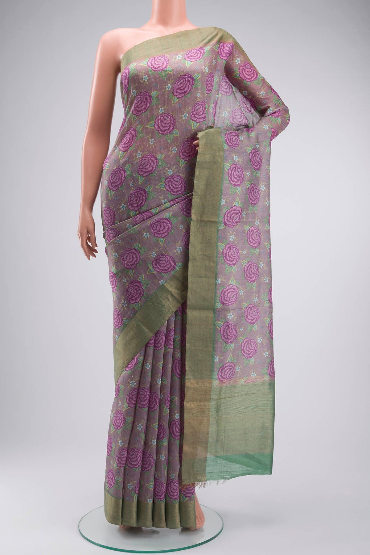 Lavender Bhagalpuri Tussar Silk Saree with Printed design on the body and Zari Border displayed on a mannequin
