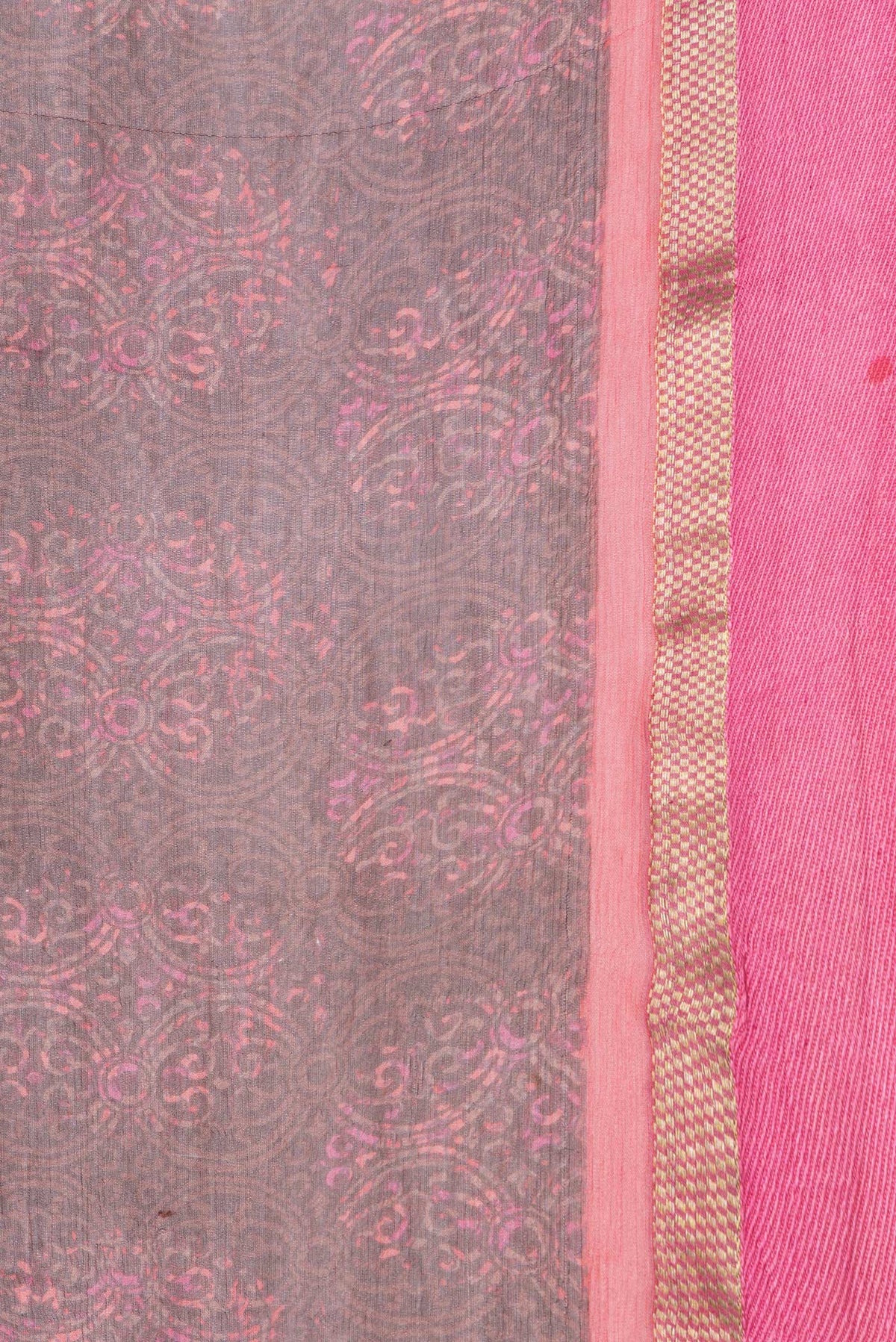 Border image of Brown Dual Tone Chiffon Saree with Printed design on the body and Zari Border. 