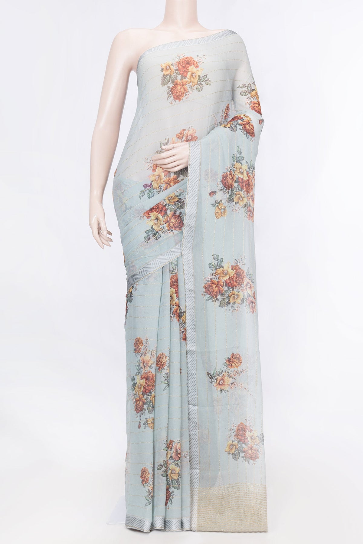 Grey Dual Tone Mysore Chiffon Saree with Stripes on the body and Zari Border displayed on a mannequin