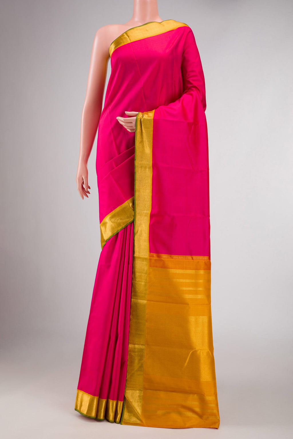 Dark Pink Dual Tone Kanchipuram Silk Saree with Plain Body and Zari Border displayed on a mannequin