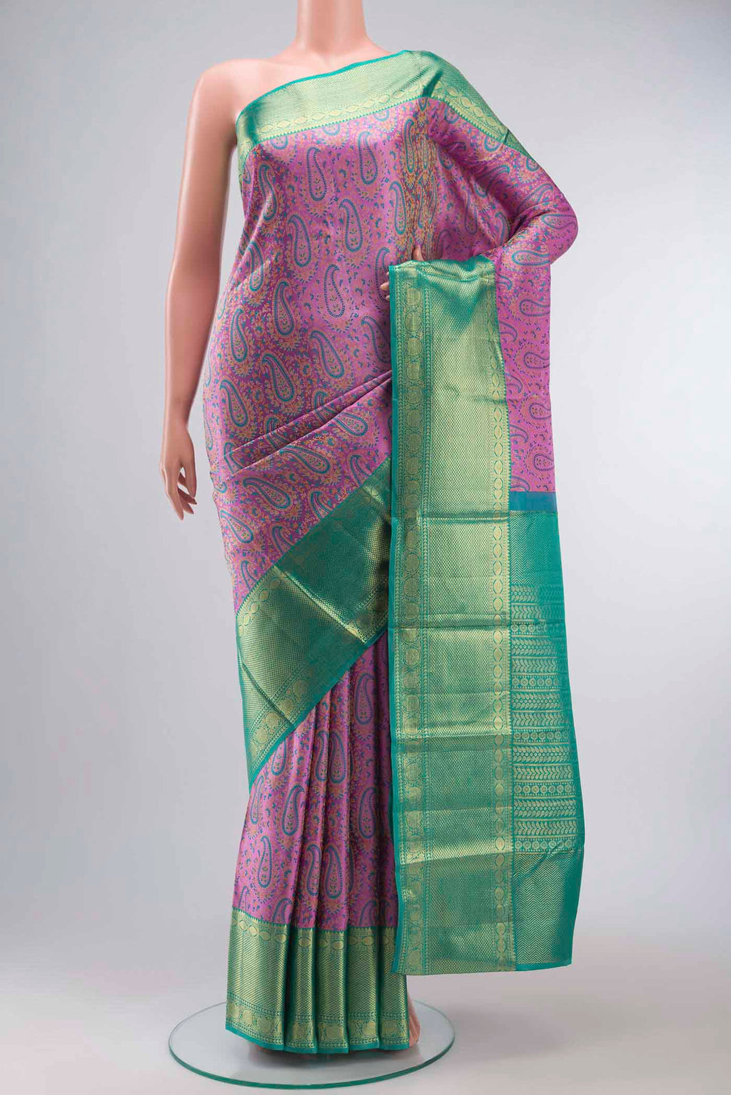 Lavender Kanchipuram Silk Saree with Jacquard design on the body and Zari Border displayed on a mannequin