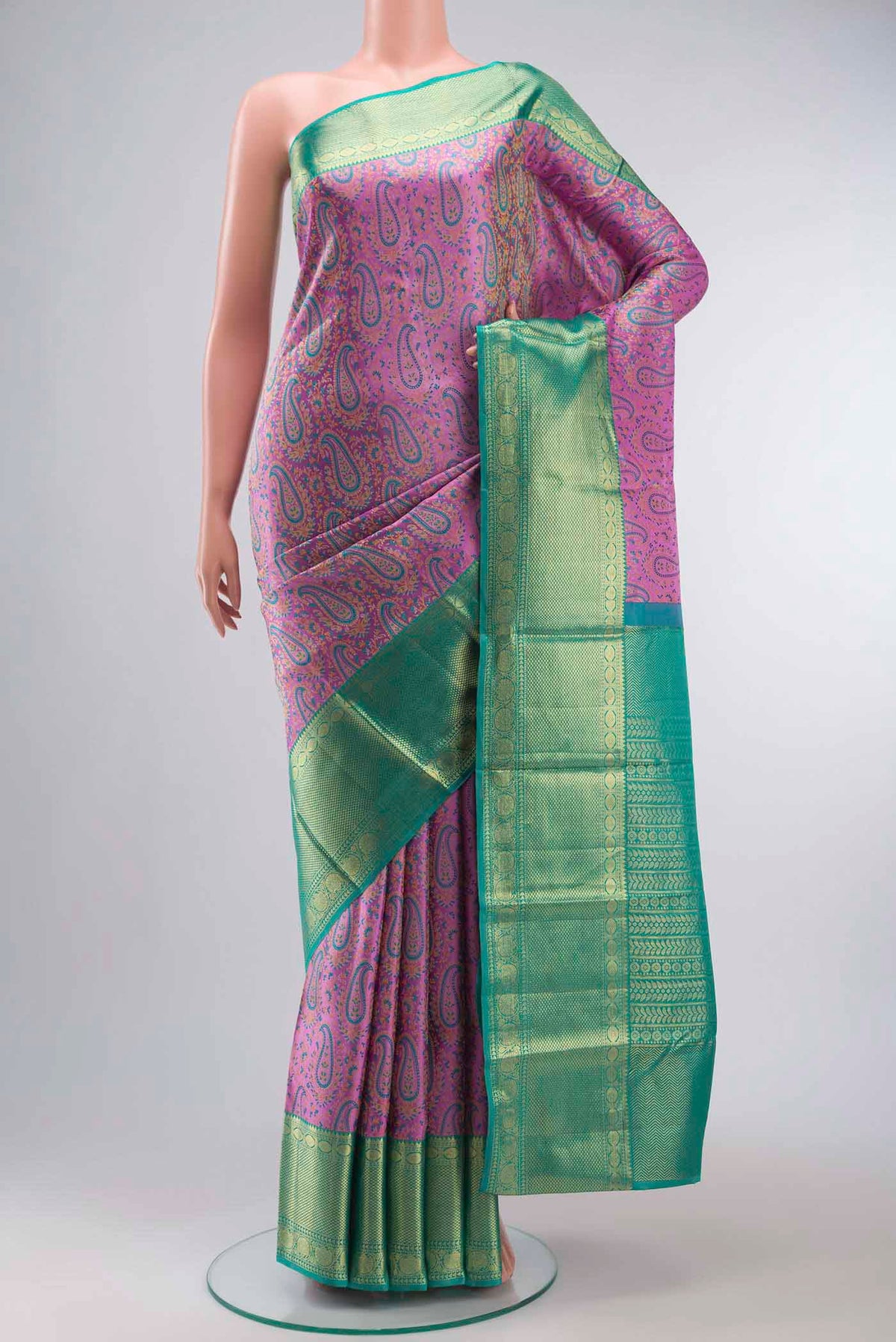 Lavender Kanchipuram Silk Saree with Jacquard design on the body and Zari Border displayed on a mannequin