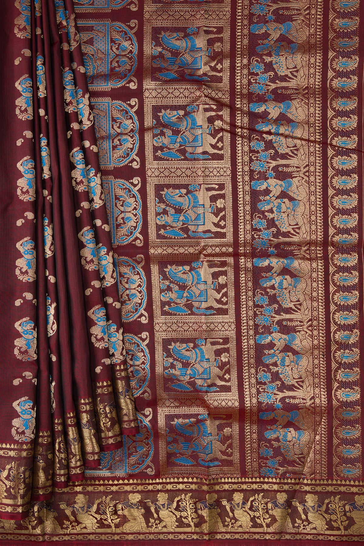 Pleats and pallu of Coffee Brown Baluchari Silk Saree with Thread Butta on the body and Zari Border. 