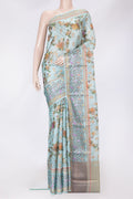 Sky Blue Dual Tone Tussar Silk Saree with Printed design on the body and Thread Border.  displayed on a mannequin