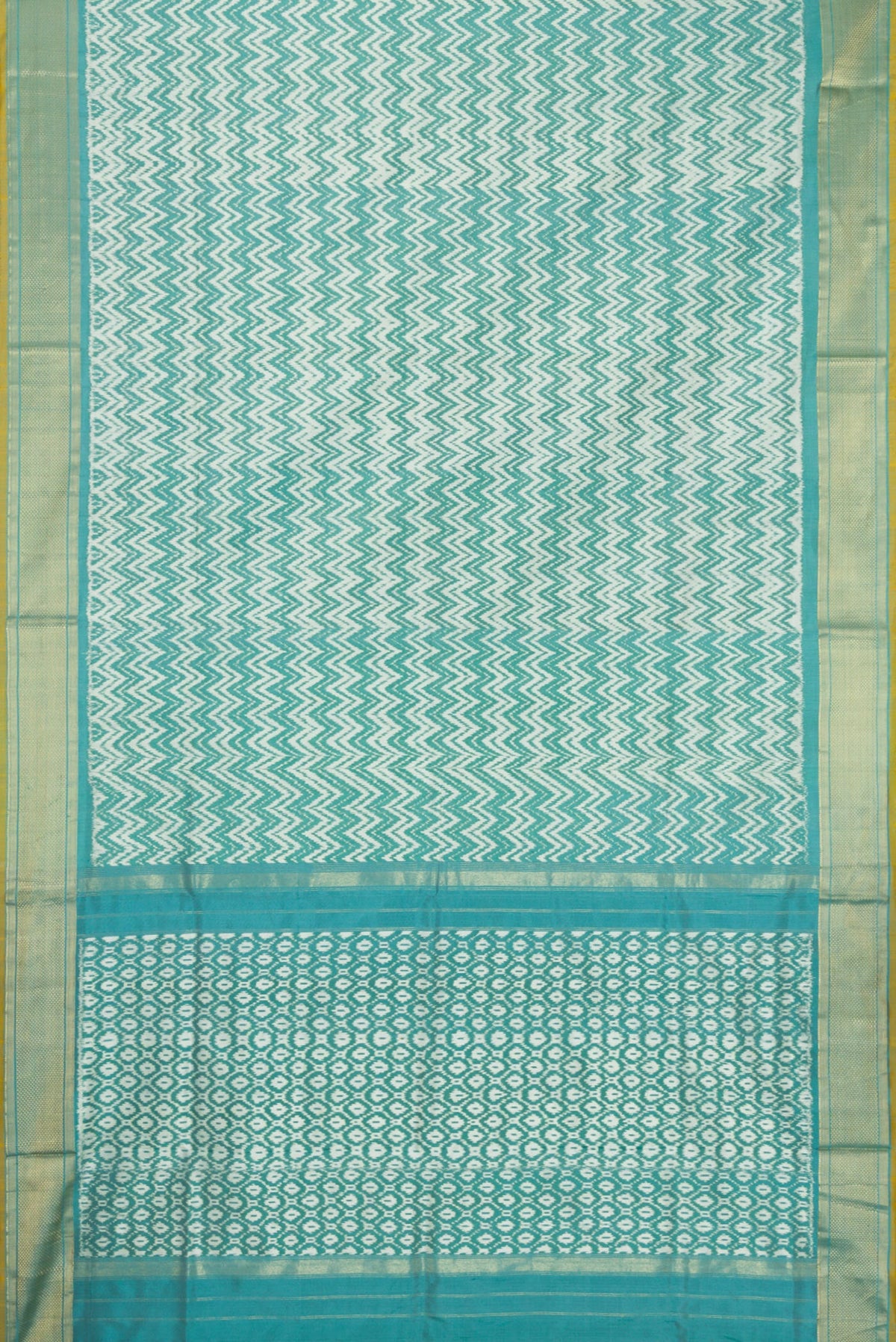 Flat view of Blue Dual Tone Double Ikat Saree with Ikat Print on the body and Zari Border. 