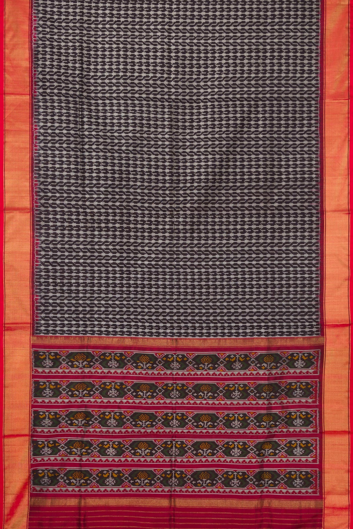 Flat view of Black Dual Tone Double Ikat Saree with Ikat Print on the body and Zari Border. 