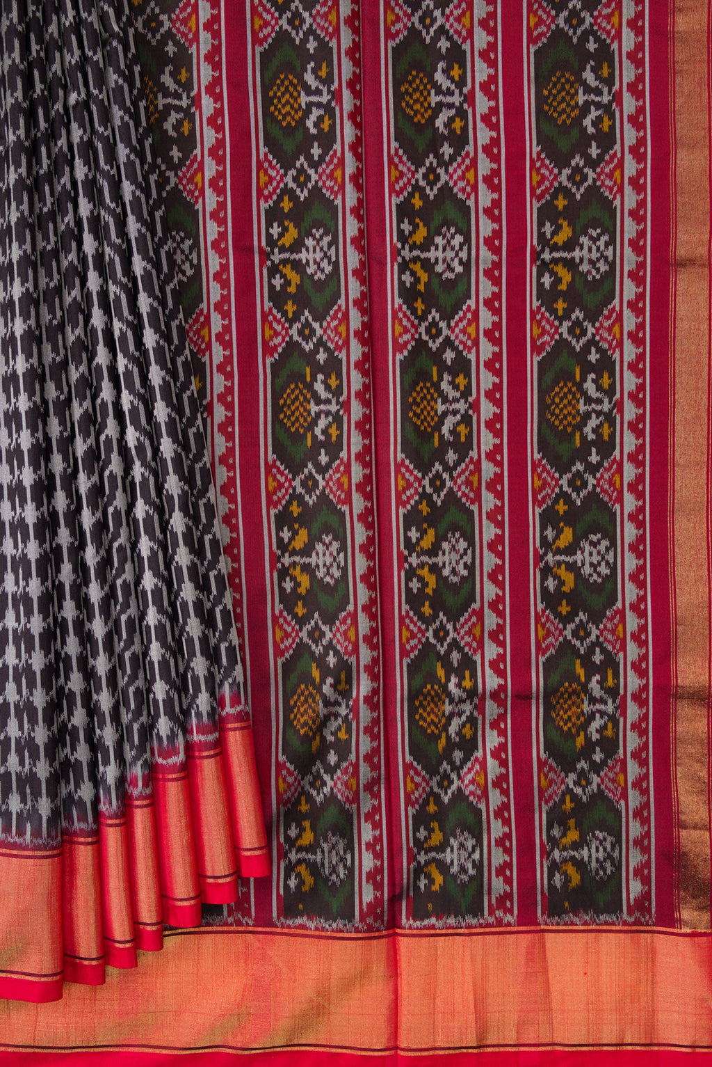 Pleats and pallu of Black Dual Tone Double Ikat Saree with Ikat Print on the body and Zari Border. 