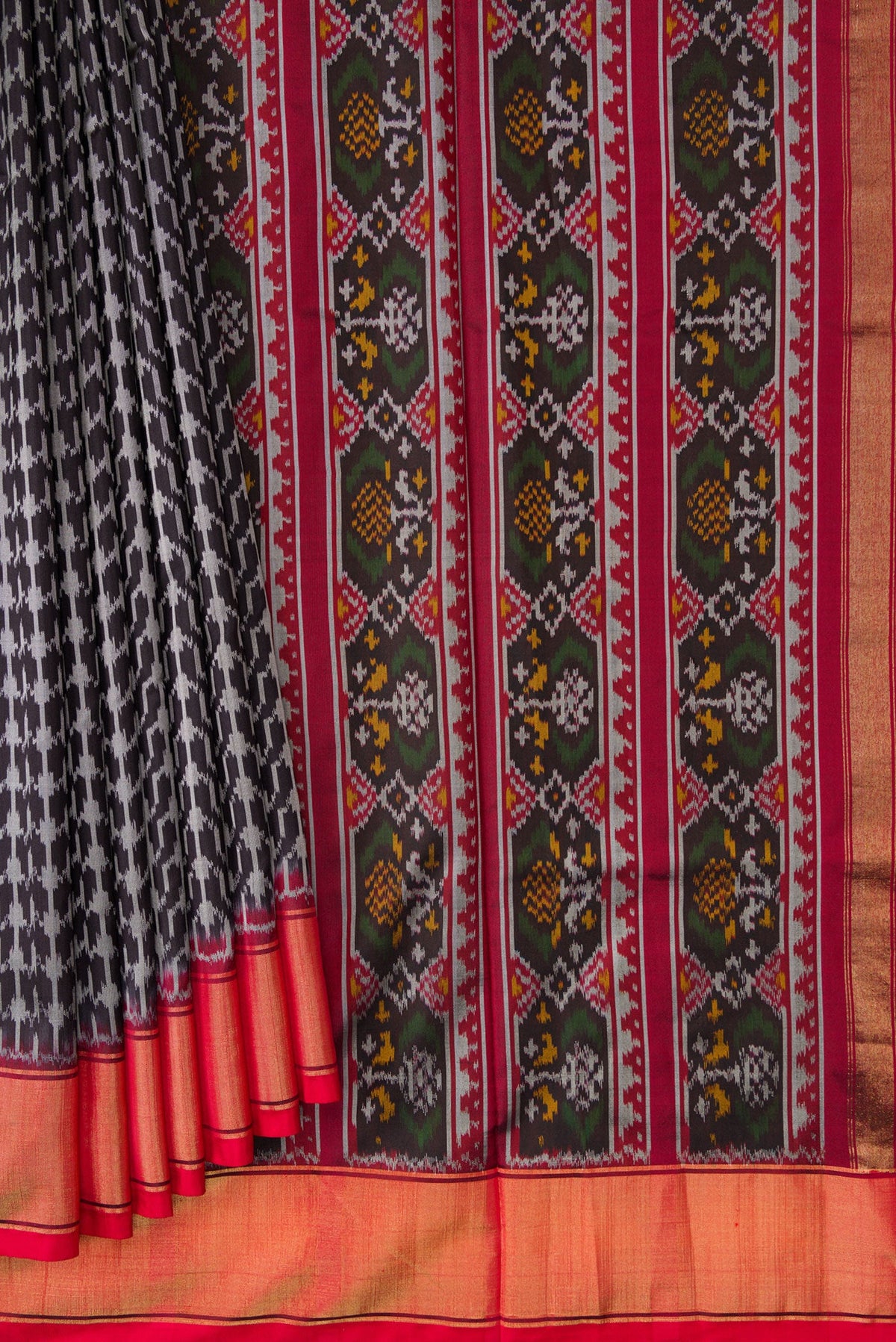 Pleats and pallu of Black Dual Tone Double Ikat Saree with Ikat Print on the body and Zari Border. 