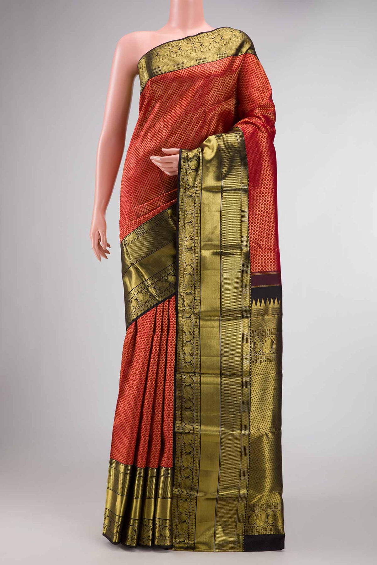 Maroon Dual Tone Kanchipuram Saree with Zari Brocade on the body and Zari Border displayed on a mannequin