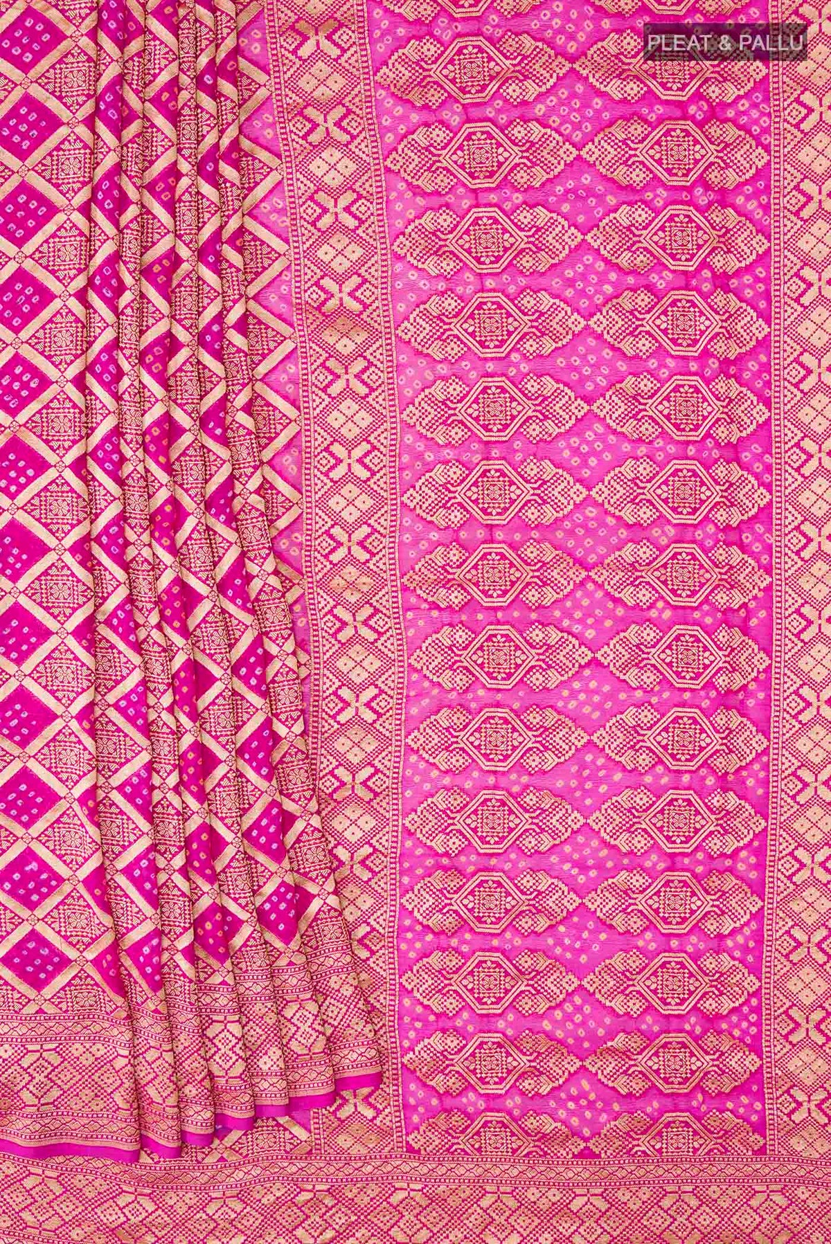 Pleats and pallu of Pink Banarasi Georgette Saree with Bandhani Print on the body and Zari Border