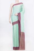 Sea Green Dual Tone Mysore Crepe Saree with Jacquard With Zari Butta on the body and Zari Border displayed on a mannequin