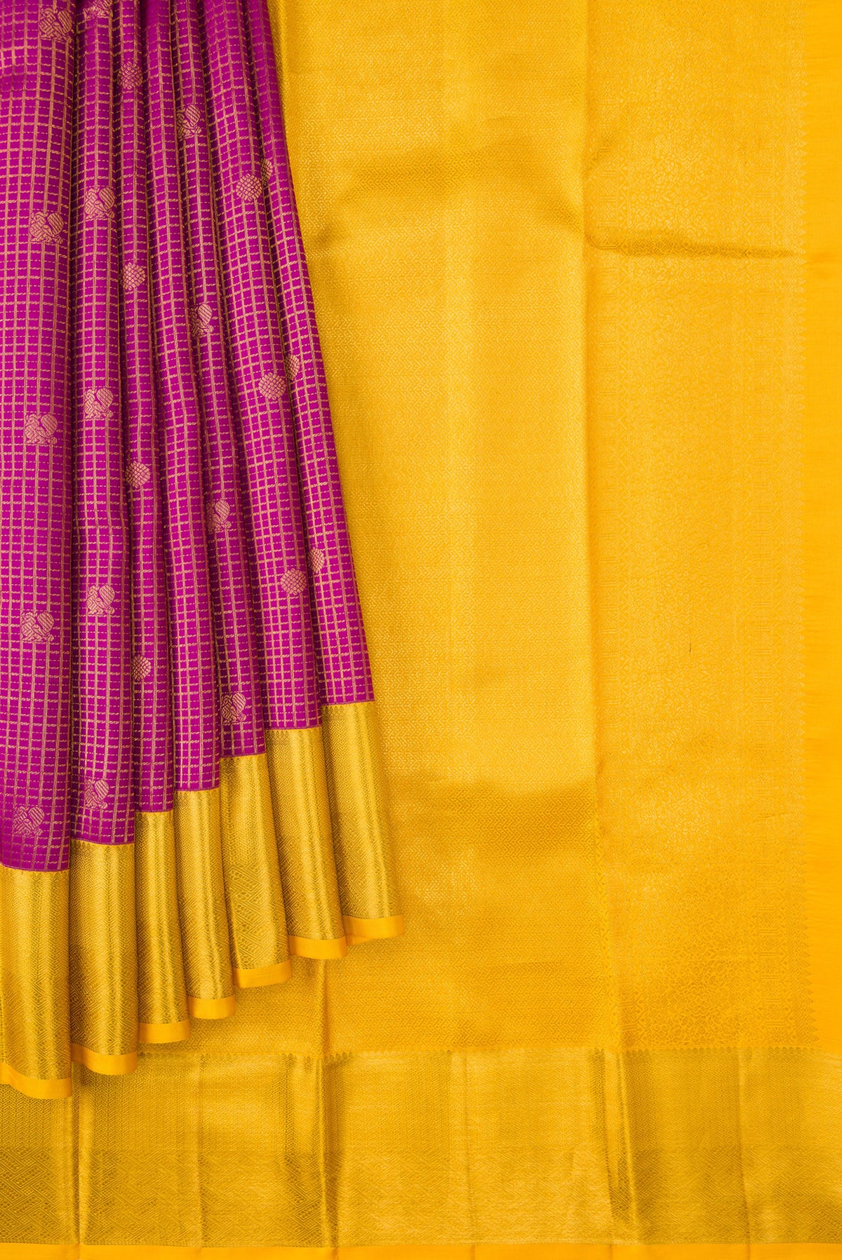 Pleats and pallu of Magenta Kanjivaram Silk Saree with Zari Brocade on the body and Zari Border. 