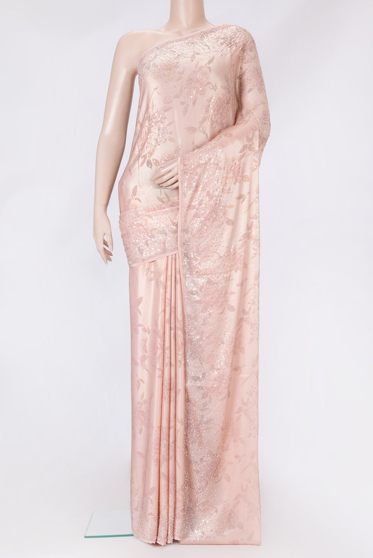 Rose Gold Dual Tone Georgette Saree with Embroidery on the body and Embroidery Border.  displayed on a mannequin