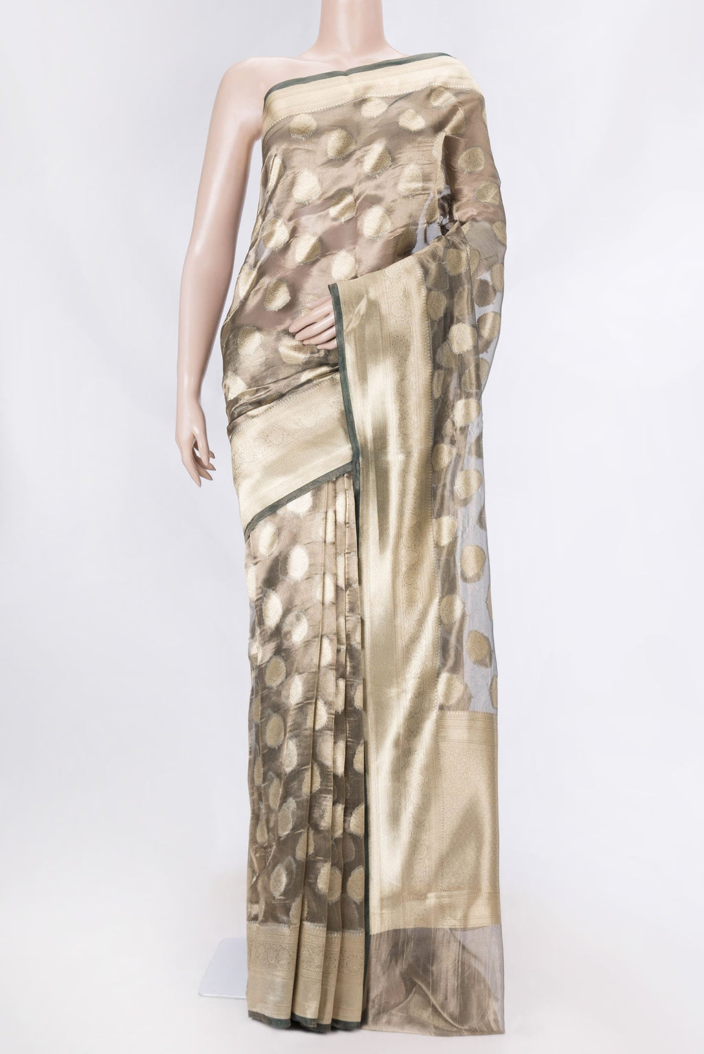 Mehandi Green Dual Tone Organza Silk Saree with Zari Butta on the body and Zari Border displayed on a mannequin