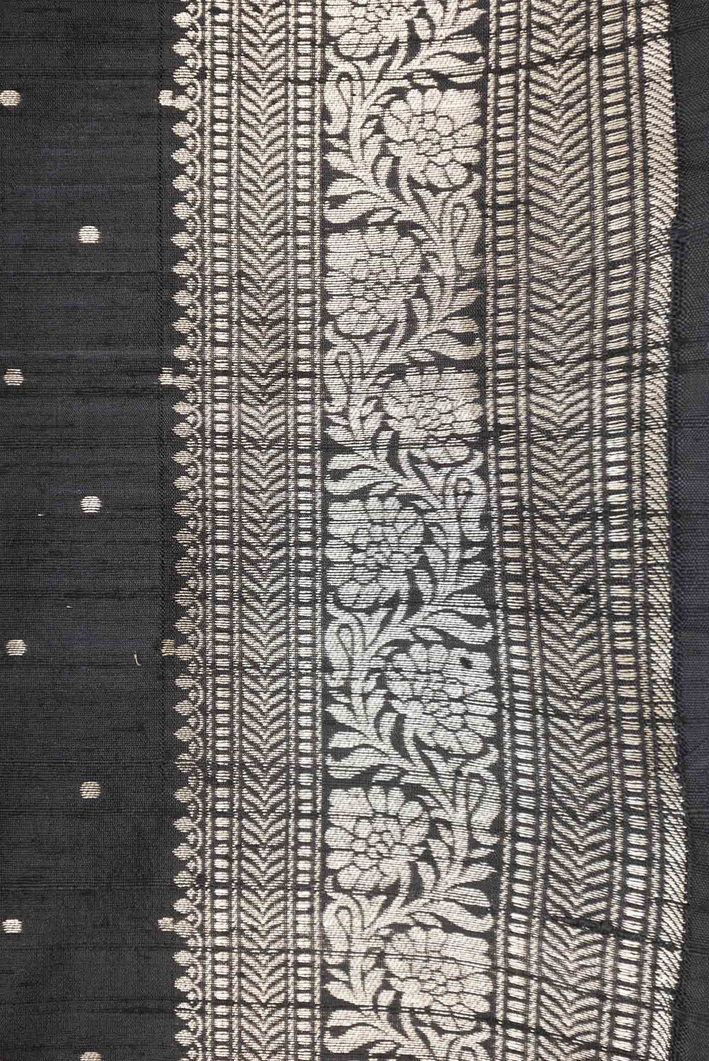 Border image of Black Dual Tone Raw Silk Saree with Zari Butta on the body and Zari Border