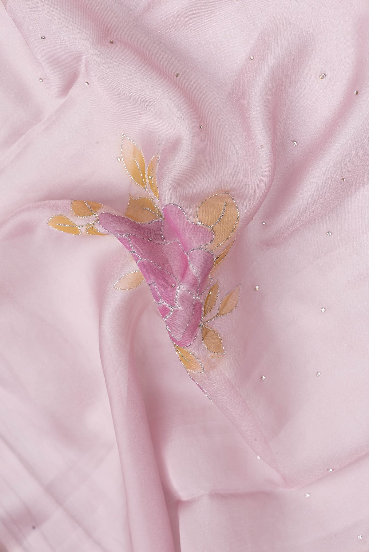 Close up of Pink Dual Tone Georgette Saree with Embroidery on the body and Embroidery Border.  displaying folds